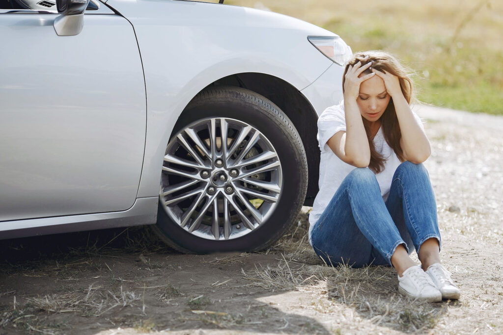 Frustrated Woman With New Broken Down Car